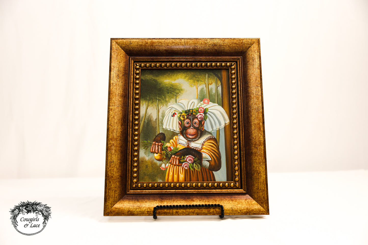 Singerie monkey painting dressed in vintage clothing