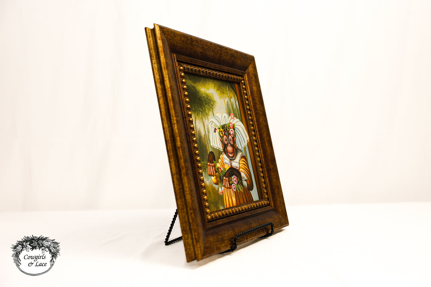 Framed monkey portrait canvas painting with gold frame